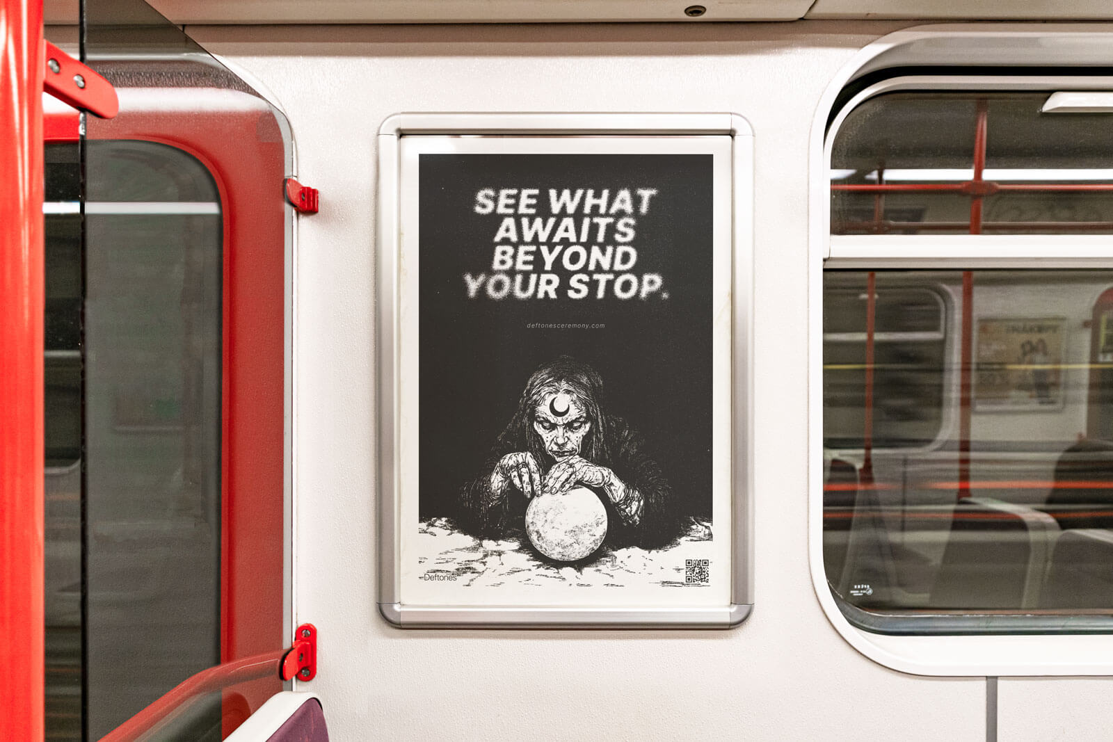 An image of the OOH teaser poster in a metro train car